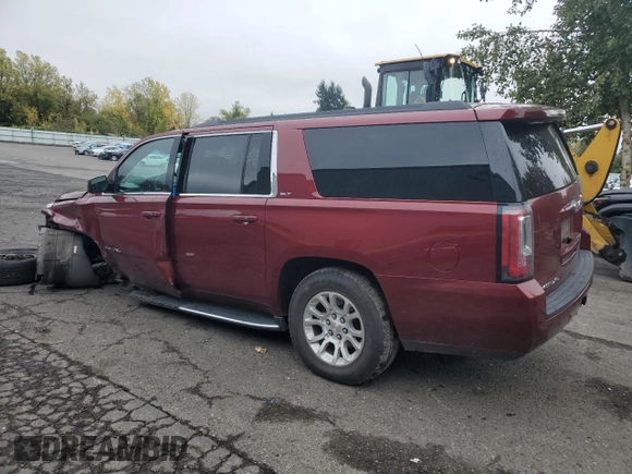 2019 GMC Yukon XL SLT with VIN 1GKS2GKC6KR341781, listed as a Copart auction lot 77468734 with 93,482 mi miles and Salvage Title. Bid and sale history available at DreamBid. Image 2.