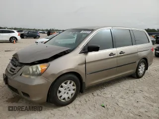 2010 Honda Odyssey LX z VIN 5FNRL3H27AB004846, wystawiony jako Copart lot #52332075 z przebiegiem 182 993 mil mil oraz Szkoda całkowita • Salvage title. Historia ofert i sprzedaży dostępna na DreamBid. Obrazek 1.