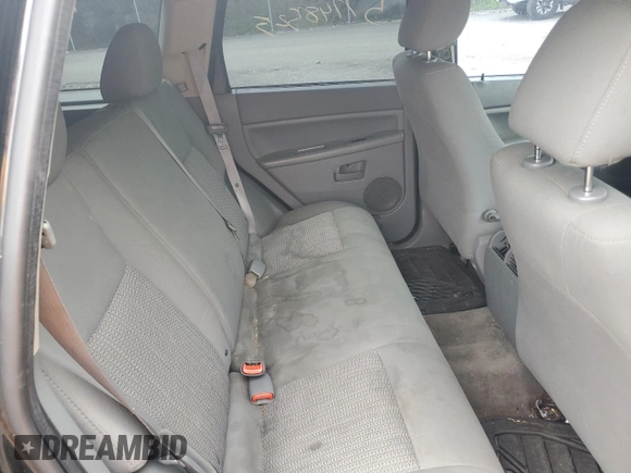 2007 Jeep Grand Cherokee Laredo z VIN 1J8GR48K47C681735, wystawiony jako Copart lot #59006435 z przebiegiem 195 517 mil mil oraz Nie do naprawy • Non repairable. Historia ofert i sprzedaży dostępna na DreamBid. Obrazek 11.