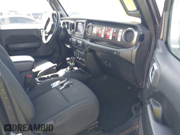 2020 Jeep Wrangler Unlimited Sport Altitude with VIN 1C4HJXDG7LW215344, listed as a IAAI auction lot 41924460 with 51,802 mi miles and . Bid and sale history available at DreamBid. Image 5.