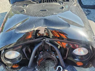 2012 Jeep Wrangler Sport with VIN 1C4AJWAG5CL273292, listed as a Copart auction lot 60135395 with 123,874 mi miles and Salvage title. Bid and sale history available at DreamBid. Image 11.