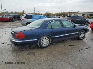 2002 Lincoln Continental with VIN 1LNHM97V22Y682098, listed as a Copart auction lot 77821624 with 0 mi miles and Salvage Title. Bid and sale history available at carsss.com. Image 3.