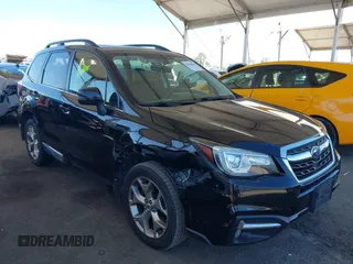 2018 Subaru Forester Touring with VIN JF2SJAWC2JH407593, listed as a IAAI auction lot 42014886 with 78,349 mi miles and . Bid and sale history available at DreamBid. Image 1.