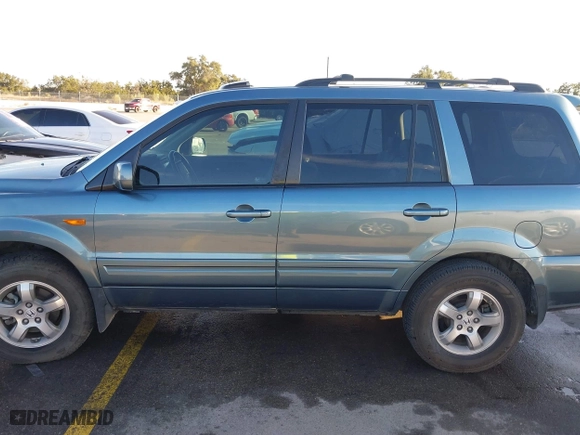 2007 Honda Pilot EX-L with VIN 5FNYF285X7B045780, listed as a IAAI auction lot 41324224 with 168,911 mi miles. Bid and sale history available at carsss.com. Image 14.