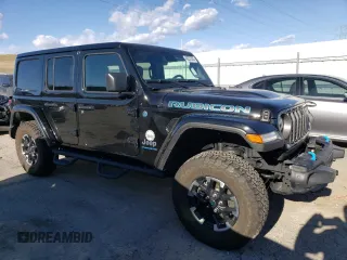 2024 Jeep Wrangler Rubicon with VIN 1C4RJXR69RW132849, listed as a Copart auction lot 48237325 with 18,725 mi miles and Salvage Title. Bid and sale history available at DreamBid. Image 4.