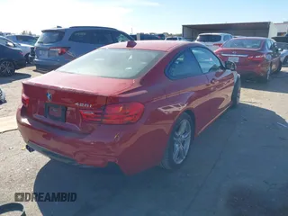 2015 BMW 4 Series 428i with VIN WBA3N3C57FK233391, listed as a IAAI auction lot 41260038 with 86,487 mi miles and . Bid and sale history available at DreamBid. Image 4.