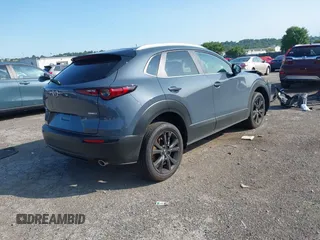 2025 Mazda CX-30 S Preferred with VIN 3MVDMBCM2SM804234, listed as a IAAI auction lot 42391251 with 413 mi miles and . Bid and sale history available at DreamBid. Image 4.
