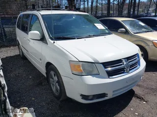 2009 Dodge Grand Caravan SXT with VIN 2D8HN54X99R651852, listed as a IAAI auction lot 41855895 with 112,066 mi miles. Bid and sale history available at carsss.com. Image 1.