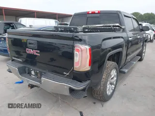 2018 GMC Sierra 1500 SLT z VIN 3GTU2NEC7JG617050, wystawiony jako IAAI lot #42403912 z przebiegiem 215 748 mil mil oraz . Historia ofert i sprzedaży dostępna na DreamBid. Obrazek 4.