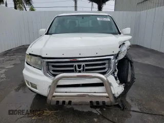2014 Honda Ridgeline RTL with VIN 5FPYK1F57EB009851, listed as a Copart auction lot 62319504 with 55,718 mi miles and Clean Title. Bid and sale history available at carsss.com. Image 5.