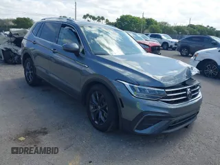 2023 Volkswagen Tiguan SE with VIN 3VV3B7AXXPM056659, listed as a IAAI auction lot 41643926 with 14,708 mi miles and . Bid and sale history available at DreamBid. Image 1.