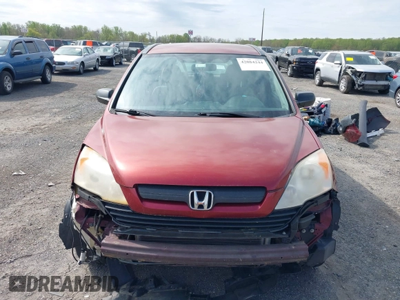 2007 Honda CR-V LX with VIN JHLRE38327C040004, listed as a IAAI auction lot 42084244 with 271,363 mi miles. Bid and sale history available at carsss.com. Image 13.