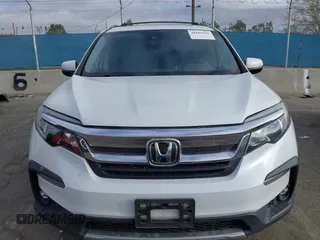 2020 Honda Pilot EX-L with VIN 5FNYF5H57LB003059, listed as a IAAI auction lot 41685916 with 114,742 mi miles. Bid and sale history available at carsss.com. Image 6.