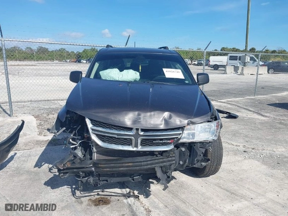 2019 Dodge Journey SE Value Pkg with VIN 3C4PDCAB7KT747315, listed as a IAAI auction lot 41028740 with 143,469 mi miles. Bid and sale history available at carsss.com. Image 12.