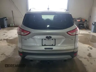 2014 Ford Escape SE z VIN 1FMCU9G97EUC43696, wystawiony jako Copart lot #57409665 z przebiegiem 68 586 mil mil oraz Czysty tytuł • Clean title. Historia ofert i sprzedaży dostępna na DreamBid. Obrazek 6.