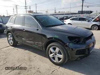 2012 Volkswagen Touareg Sport z VIN WVGEF9BP8CD008746, wystawiony jako Copart lot #45638945 z przebiegiem 138 945 mil mil oraz Szkoda całkowita • Salvage title. Historia ofert i sprzedaży dostępna na DreamBid. Obrazek 4.