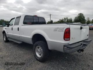 2002 Ford F-350 XL with VIN 3FTSW31F32MA17869, listed as a Copart auction lot 71828914 with 230,191 mi miles and Salvage Title. Bid and sale history available at DreamBid. Image 2.