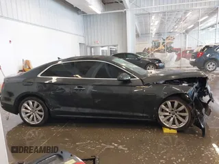 2018 Audi A5 Premium Plus with VIN WAUPNAF51JA073637, listed as a IAAI auction lot 41289291 with Not Provided miles and . Bid and sale history available at DreamBid. Image 13.