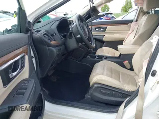 2018 Honda CR-V Touring with VIN 5J6RW2H99JL020598, listed as a IAAI auction lot 42104765 with 30,431 mi miles and . Bid and sale history available at carsss.com. Image 5.