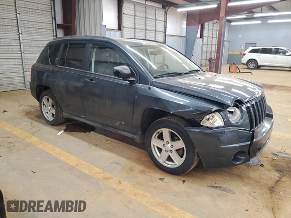 2007 Jeep Compass Sport with VIN 1J8FF47W87D130159, listed as a Copart auction lot 47032565 with 161,236 mi miles and Salvage Title. Bid and sale history available at carsss.com. Image 4.
