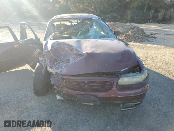 2000 Buick Regal GS with VIN 2G4WF5516Y1270238, listed as a Copart auction lot 77693904 with 0 mi miles and Salvage Title. Bid and sale history available at carsss.com. Image 5.