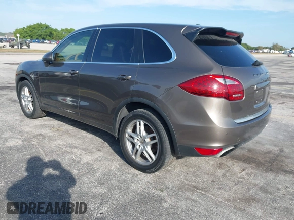 2011 Porsche Cayenne S Hybrid with VIN WP1AE2A29BLA94414, listed as a IAAI auction lot 41644386 with 76,095 mi miles. Bid and sale history available at carsss.com. Image 3.