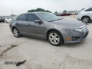 2012 Ford Fusion SE z VIN 3FAHP0HA9CR226737, wystawiony jako Copart lot #57229835 z przebiegiem 204 811 mil mil oraz Szkoda całkowita • Salvage title. Historia ofert i sprzedaży dostępna na DreamBid. Obrazek 4.