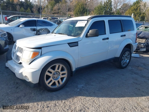 2011 Dodge Nitro Heat with VIN 1D4PT4GK0BW582589, listed as a IAAI auction lot 41015035 with 130,098 mi miles. Bid and sale history available at carsss.com. Image 18.