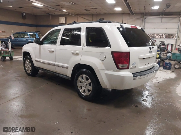 2009 Jeep Grand Cherokee Limited with VIN 1J8GR58K29C553812, listed as a IAAI auction lot 41520065 with 203,595 mi miles. Bid and sale history available at carsss.com. Image 3.