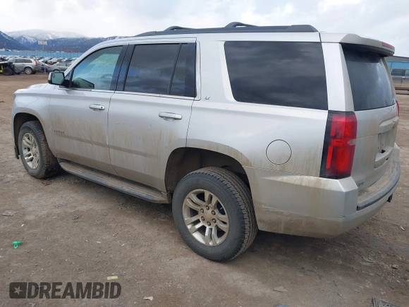 2019 Chevrolet Tahoe LT with VIN 1GNSKBKC7KR175468, listed as a IAAI auction lot 41680274 with 159,155 mi miles and . Bid and sale history available at DreamBid. Image 3.