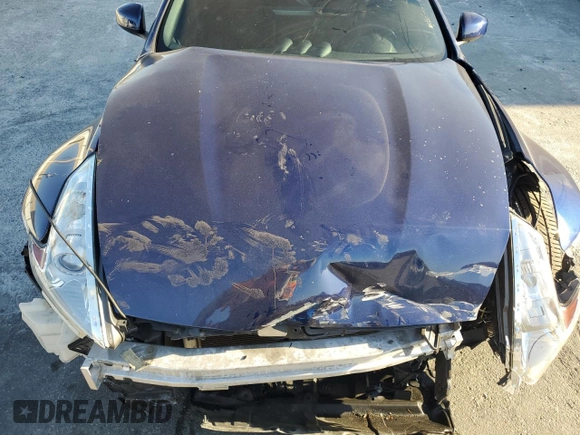 2017 Nissan 370Z z VIN JN1AZ4EH6HM952086, wystawiony jako Copart lot #88158105 z przebiegiem Nie podano mil oraz Szkoda całkowita • Salvage title. Historia ofert i sprzedaży dostępna na DreamBid. Obrazek 12.