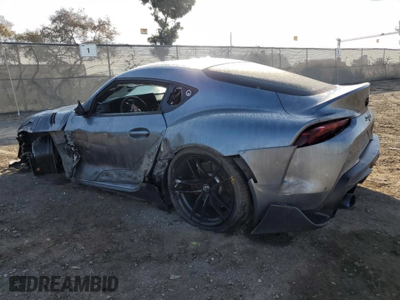 2022 Toyota Supra 3.0 with VIN WZ1DB0C0XNW046741, listed as a Copart auction lot 43457735 with 60,705 mi miles and Salvage title. Bid and sale history available at DreamBid. Image 2.