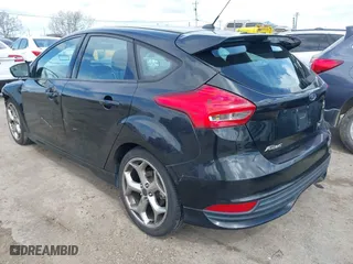 2015 Ford Focus ST with VIN 1FADP3L97FL334743, listed as a IAAI auction lot 41923997 with 200,549 mi miles. Bid and sale history available at carsss.com. Image 3.