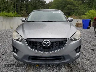 2013 Mazda CX-5 Touring with VIN JM3KE2CE1D0115023, listed as a Copart auction lot 52017905 with 174,254 mi miles and Clean Title. Bid and sale history available at carsss.com. Image 5.