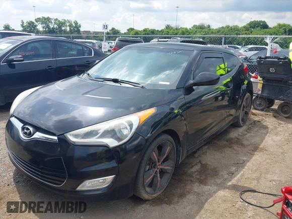 2013 Hyundai Veloster w/Black Int с VIN KMHTC6ADXDU084704, выставлен на аукционе IAAI как лот 42443297 с пробегом 111 587 миль миль и . История ставок и продаж доступна на DreamBid. Изображение 6.