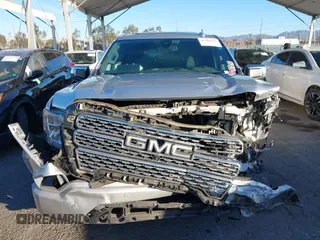 2019 GMC Sierra 1500 SLT z VIN 3GTP8DED8KG224724, wystawiony jako IAAI lot #41389124 z przebiegiem 118 106 mil mil oraz . Historia ofert i sprzedaży dostępna na DreamBid. Obrazek 13.