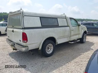 1998 Ford F-150 with VIN 1FTZF18WXWNA55197, listed as a IAAI auction lot 42710732 with 106,107 mi miles and . Bid and sale history available at DreamBid. Image 4.