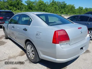 2006 Mitsubishi Galant DE z VIN 4A3AB26F56E029833, wystawiony jako IAAI lot #42145340 z przebiegiem 163 938 mil mil oraz . Historia ofert i sprzedaży dostępna na DreamBid. Obrazek 3.