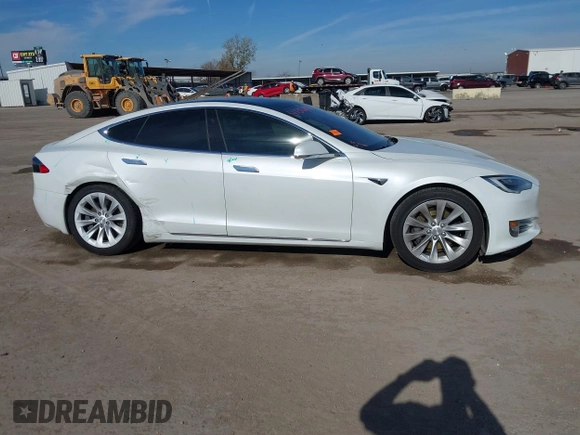 2020 Tesla Model S Long Range with VIN 5YJSA1E23LF360441, listed as a IAAI auction lot 41312865 with 68,967 mi miles and . Bid and sale history available at DreamBid. Image 13.