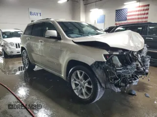 2015 Jeep Grand Cherokee Summit z VIN 1C4RJFJG1FC628532, wystawiony jako Copart lot #52546755 z przebiegiem 107 700 mil mil oraz Szkoda całkowita • Salvage title. Historia ofert i sprzedaży dostępna na DreamBid. Obrazek 4.