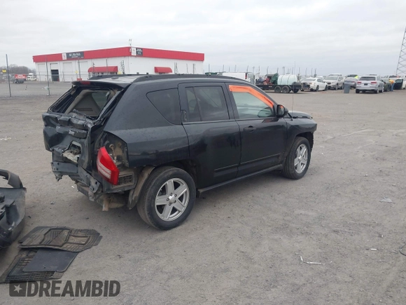 2008 Jeep Compass Sport with VIN 1J8FT47058D519816, listed as a IAAI auction lot 41694184 with 238,719 mi miles. Bid and sale history available at carsss.com. Image 4.