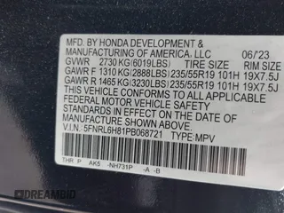 2023 Honda Odyssey Touring with VIN 5FNRL6H81PB068721, listed as a IAAI auction lot 41489618 with 20,202 mi miles and . Bid and sale history available at DreamBid. Image 9.
