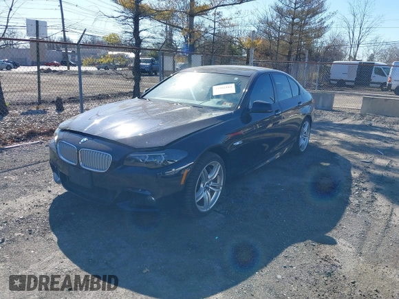 2013 BMW 5 Series 550i xDrive with VIN WBAFU9C52DDY70807, listed as a IAAI auction lot 41902163 with 92,021 mi miles and . Bid and sale history available at carsss.com. Image 2.