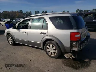 2005 Ford Freestyle SE with VIN 1FMZK01105GA19828, listed as a Copart auction lot 84290684 with 231,841 mi miles and Salvage Title. Bid and sale history available at carsss.com. Image 2.