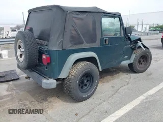 2000 Jeep Wrangler SE with VIN 1J4FA29P0YP728370, listed as a IAAI auction lot 41788463 with 186,995 mi miles. Bid and sale history available at carsss.com. Image 4.