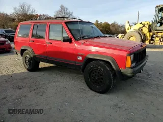 1994 Jeep Cherokee Sport with VIN 1J4FJ68S3RL239208, listed as a Copart auction lot 79121184 with 226,579 mi miles and Salvage title. Bid and sale history available at DreamBid. Image 12.