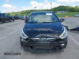 2014 Hyundai Accent SE z VIN KMHCU5AE6EU165345, wystawiony jako IAAI lot #42308781 z przebiegiem 98 216 mil mil oraz . Historia ofert i sprzedaży dostępna na DreamBid. Obrazek 13.