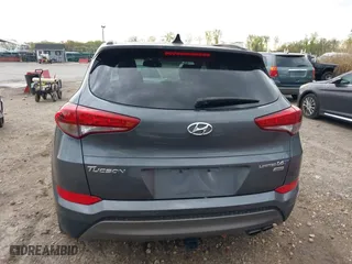 2016 Hyundai Tucson Limited with VIN KM8J3CA27GU088248, listed as a IAAI auction lot 42033882 with 102,112 mi miles. Bid and sale history available at carsss.com. Image 16.