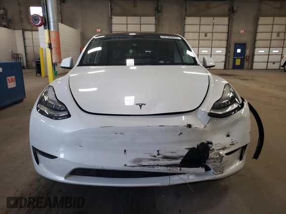 2023 Tesla Model Y Long Range z VIN 7SAYGDEE5PA067389, wystawiony jako Copart lot #54109625 z przebiegiem 24 849 mil mil oraz Szkody całkowita. Historia ofert i sprzedaży dostępna na DreamBid. Obrazek 5.