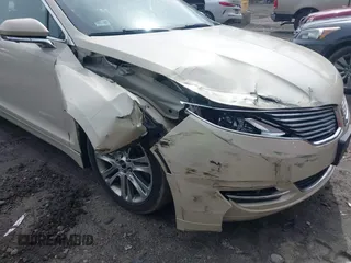 2014 Lincoln MKZ with VIN 3LN6L2J9XER803301, listed as a IAAI auction lot 41740792 with 170,376 mi miles. Bid and sale history available at carsss.com. Image 6.